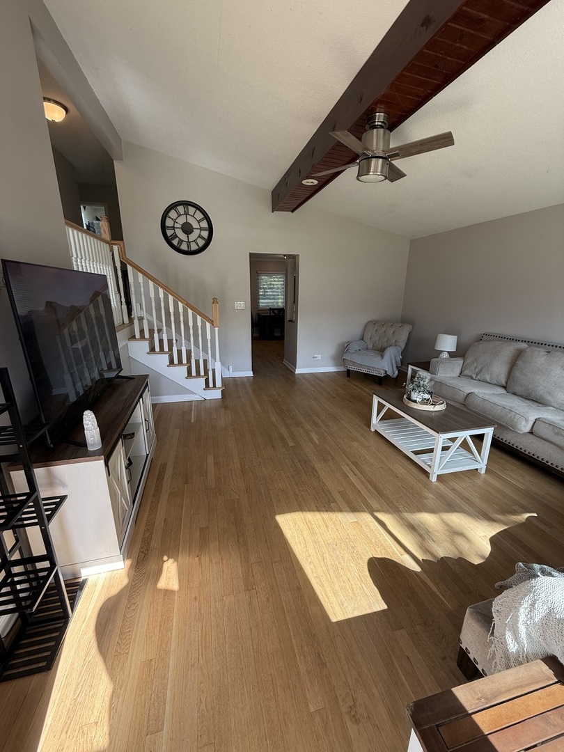4326 151st Street Midlothian, IL 60445 - Photo 3 of 26 a living room with patio bathtub and a wooden floor