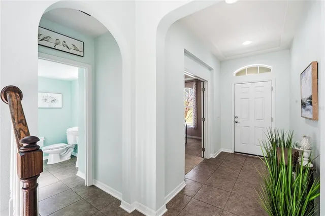 a view of a bathroom with sink and mirror