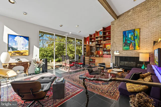 a dining room with a table and chairs
