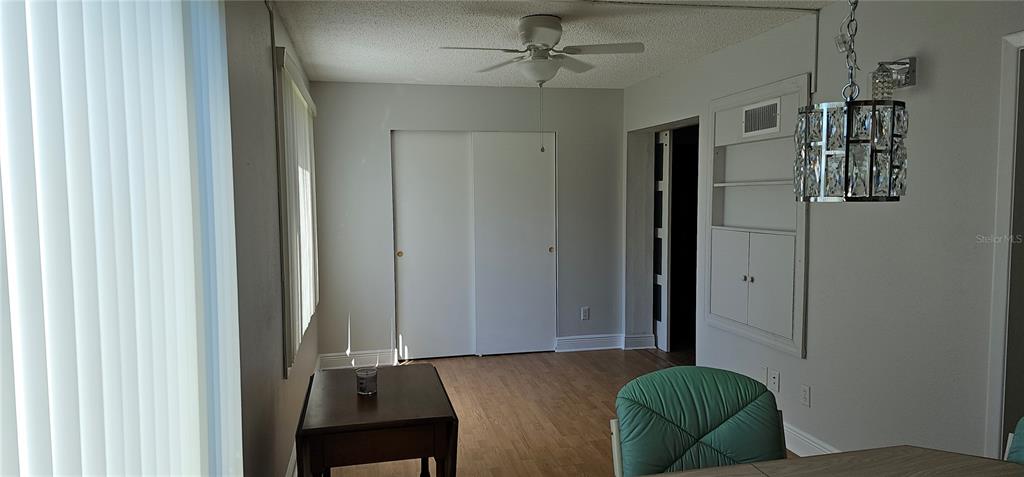 2450 Canadian Way, Unit 26 Clearwater, FL 33763 - Photo 17 of 32 a living room with furniture and a window