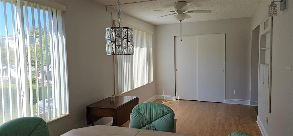 2450 Canadian Way, Unit 26 Clearwater, FL 33763 - Photo 18 of 32 a living room with furniture and a window