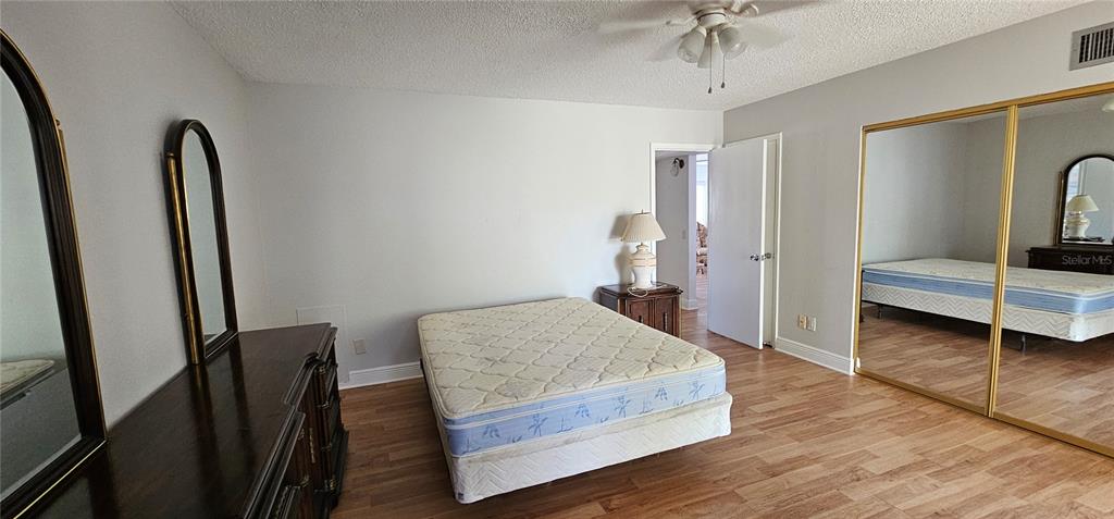 2450 Canadian Way, Unit 26 Clearwater, FL 33763 - Photo 22 of 32 a living room with furniture and a gate