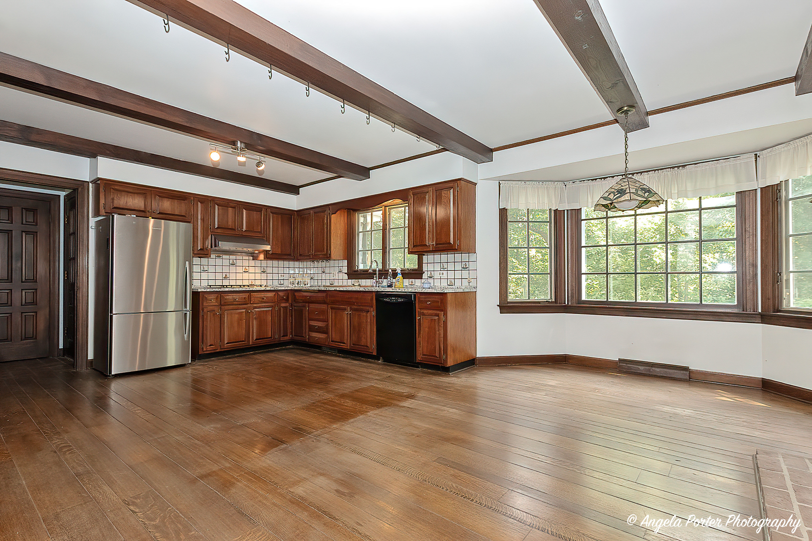 21293 North Andover Road Kildeer, IL 60047 - Photo 8 of 34 a kitchen with stainless steel appliances granite countertop a stove a sink and a refrigerator