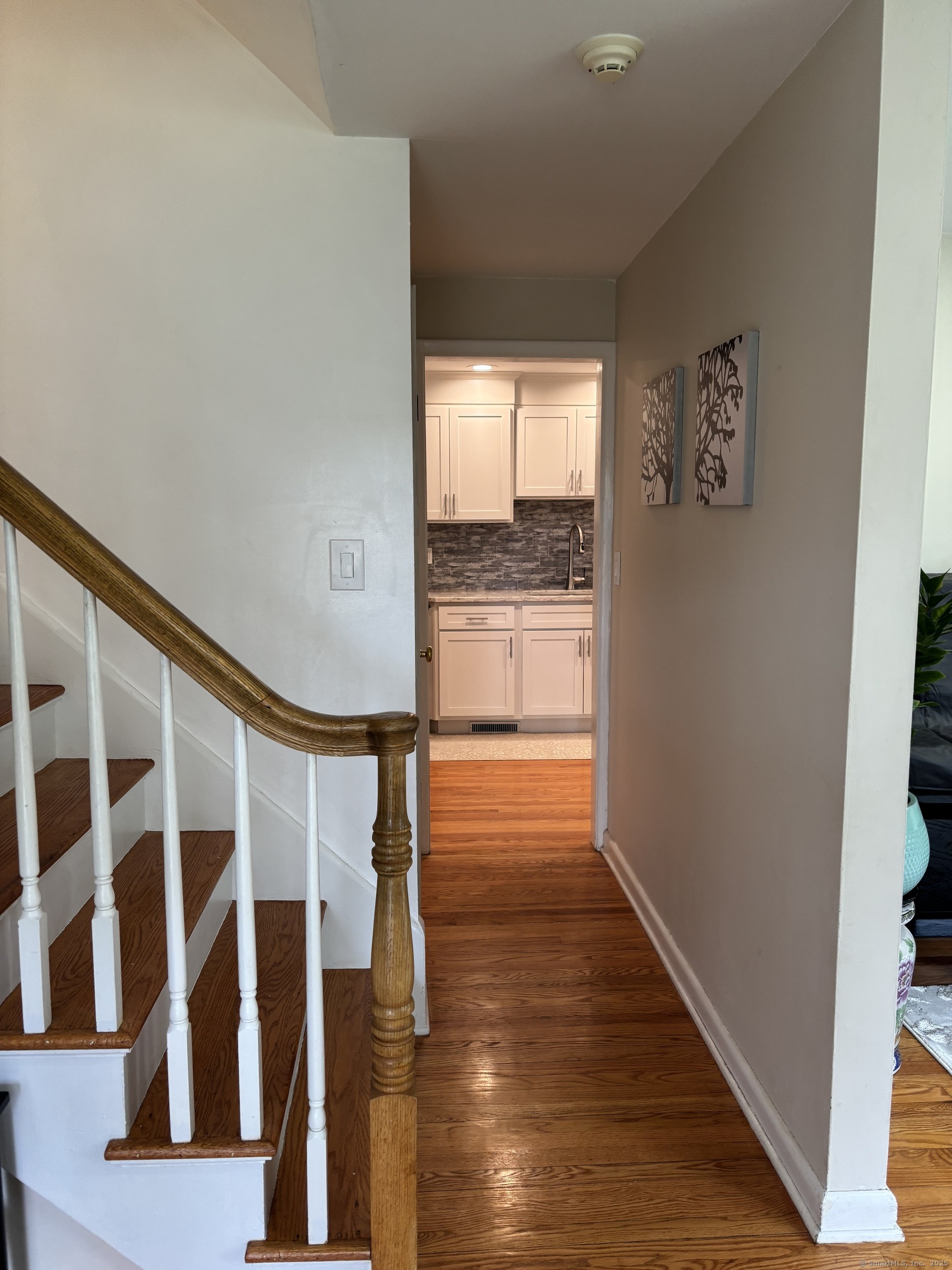 846 Beechwood Road Orange, CT 06477 - Photo 12 of 25 a view of entryway with wooden floor