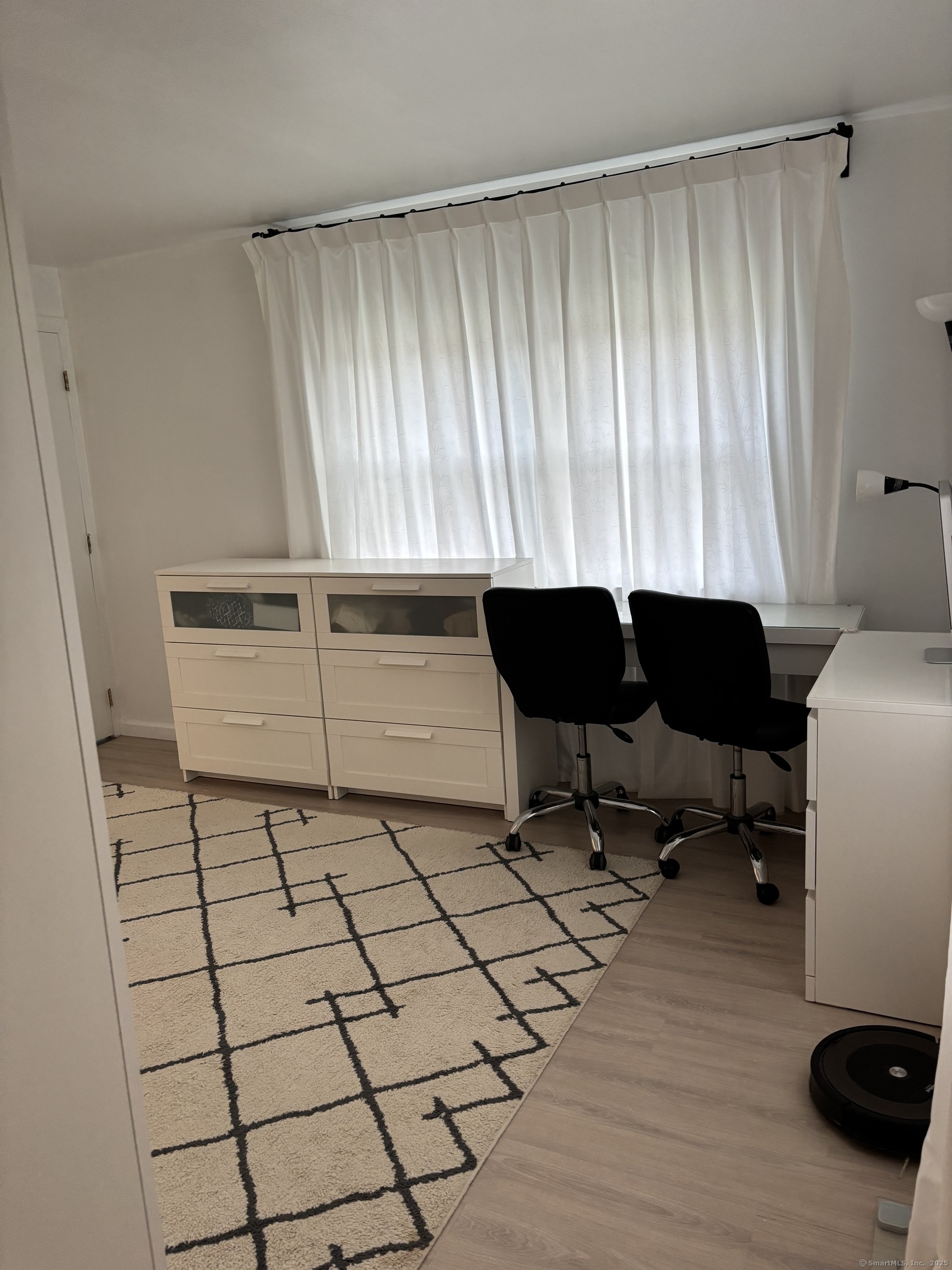 846 Beechwood Road Orange, CT 06477 - Photo 15 of 25 a living room with a furniture and a window