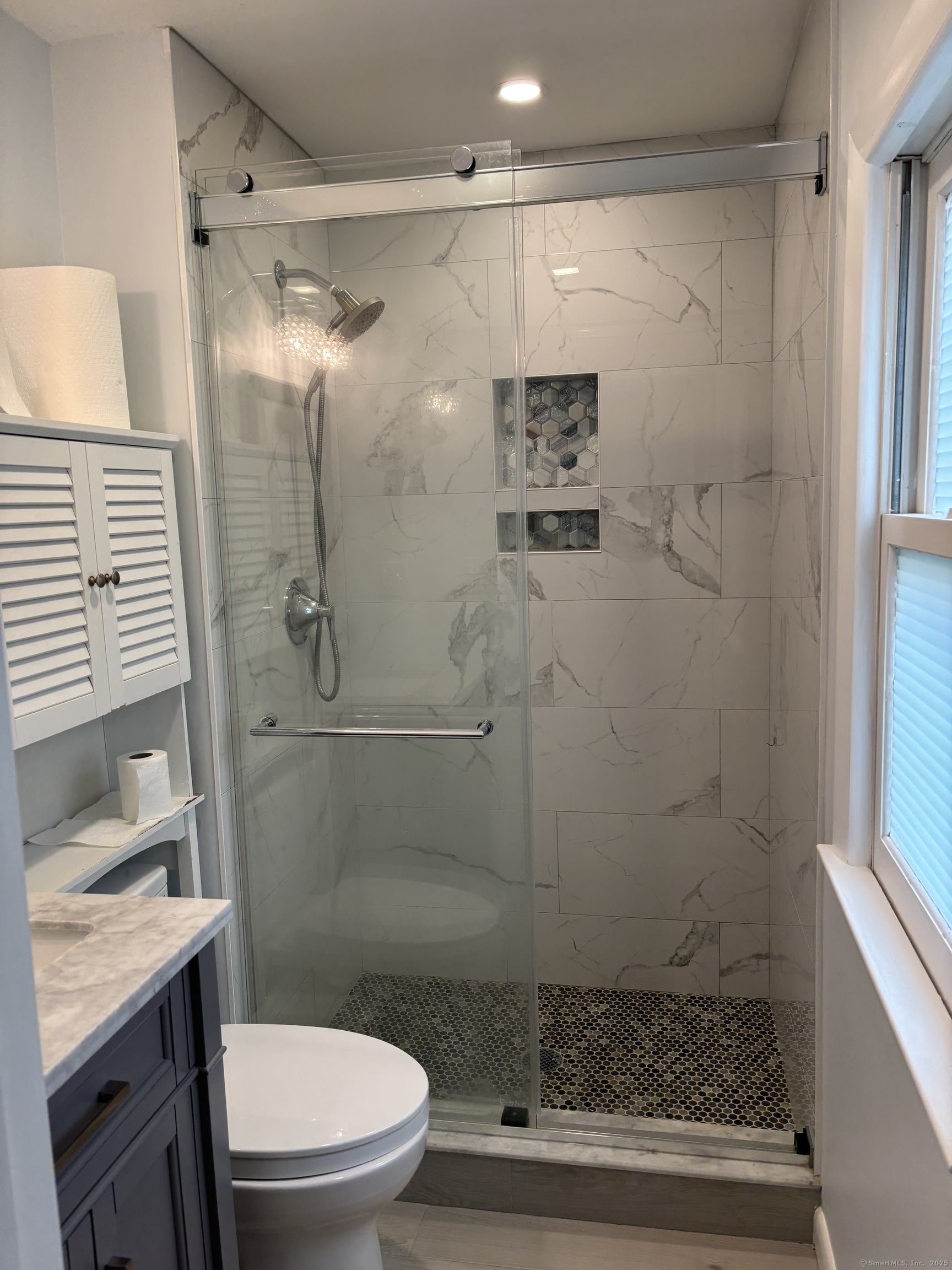 846 Beechwood Road Orange, CT 06477 - Photo 20 of 25 a bathroom with a shower and a toilet