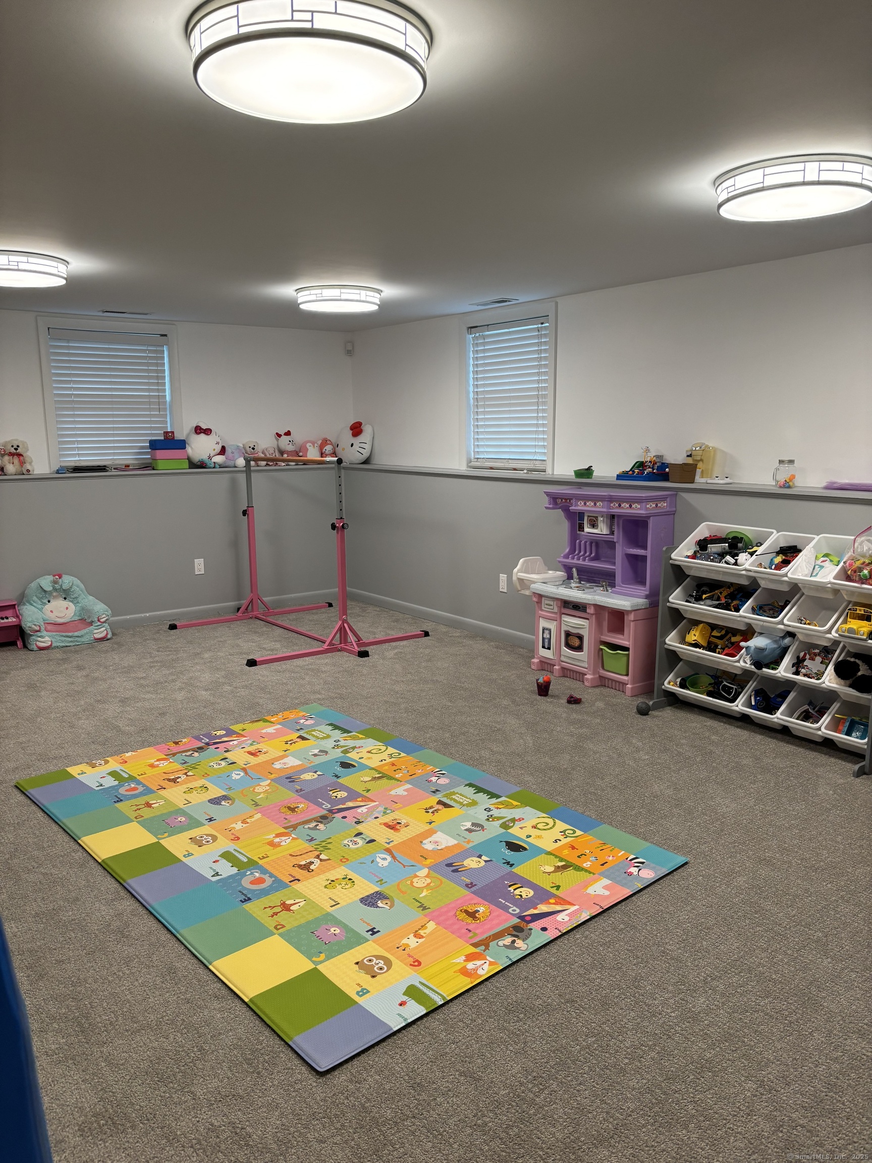 846 Beechwood Road Orange, CT 06477 - Photo 24 of 25 a room with pool table and a chandelier