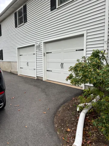 a view of a house with a garage