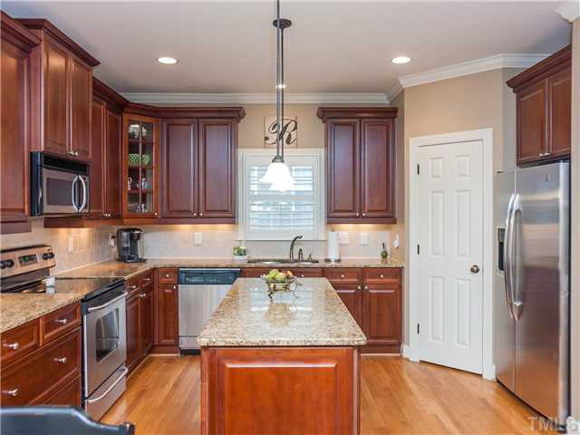 11520 Azari Court Raleigh, NC 27614 - Photo 10 of 24 Another view of the kitchen showing the pantry and stainless appliances. Kitchen