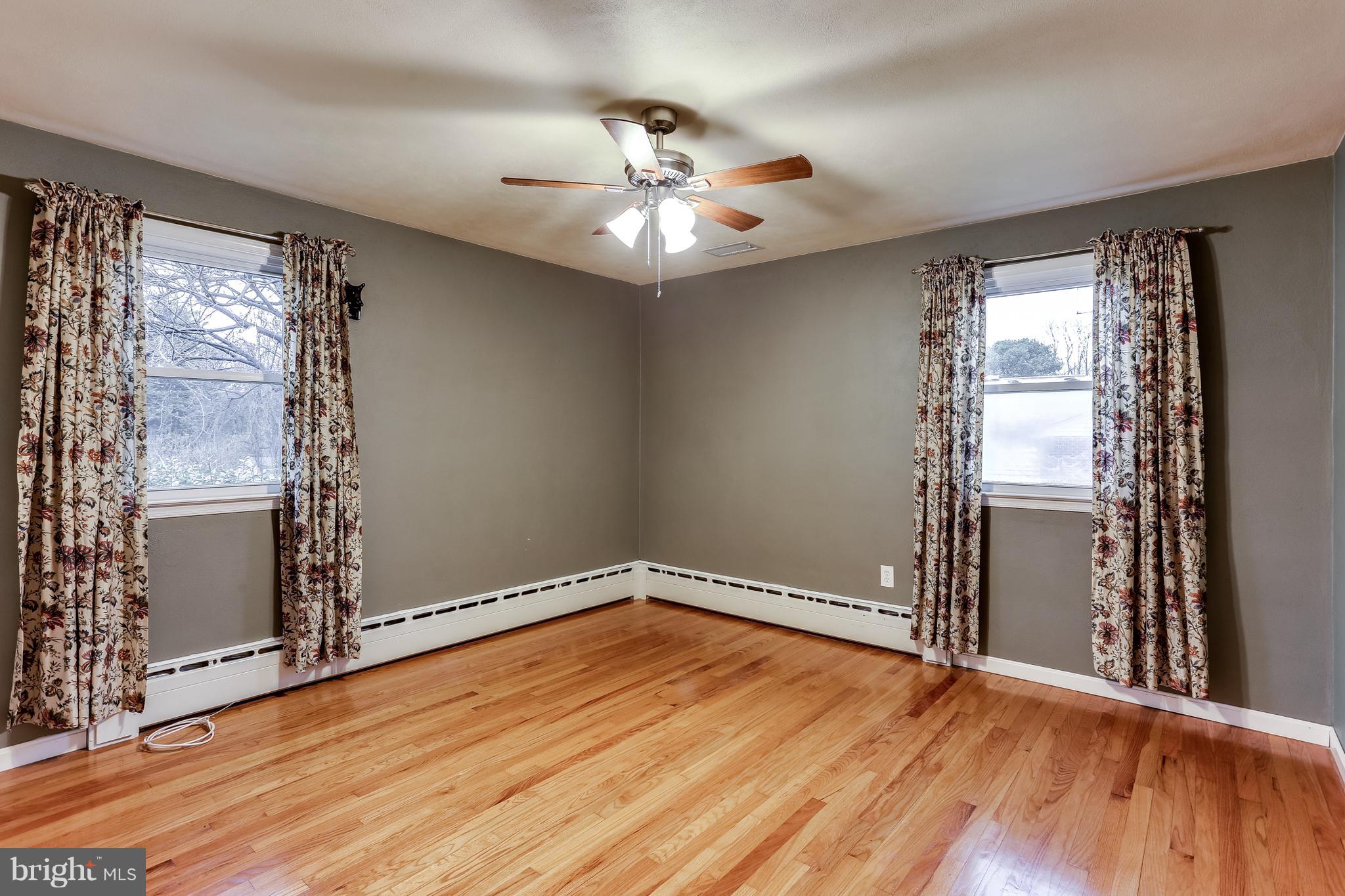 2100 Bethel Road Finksburg, MD 21048 - Photo 14 of 36 Bright, Spacious Bedroom 1 w/ New Gleaming HW Flrs