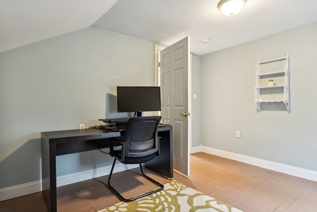 162 Proctor Road Chelmsford, MA 01824 - Photo 25 of 35 a view of a workspace with furniture and a window
