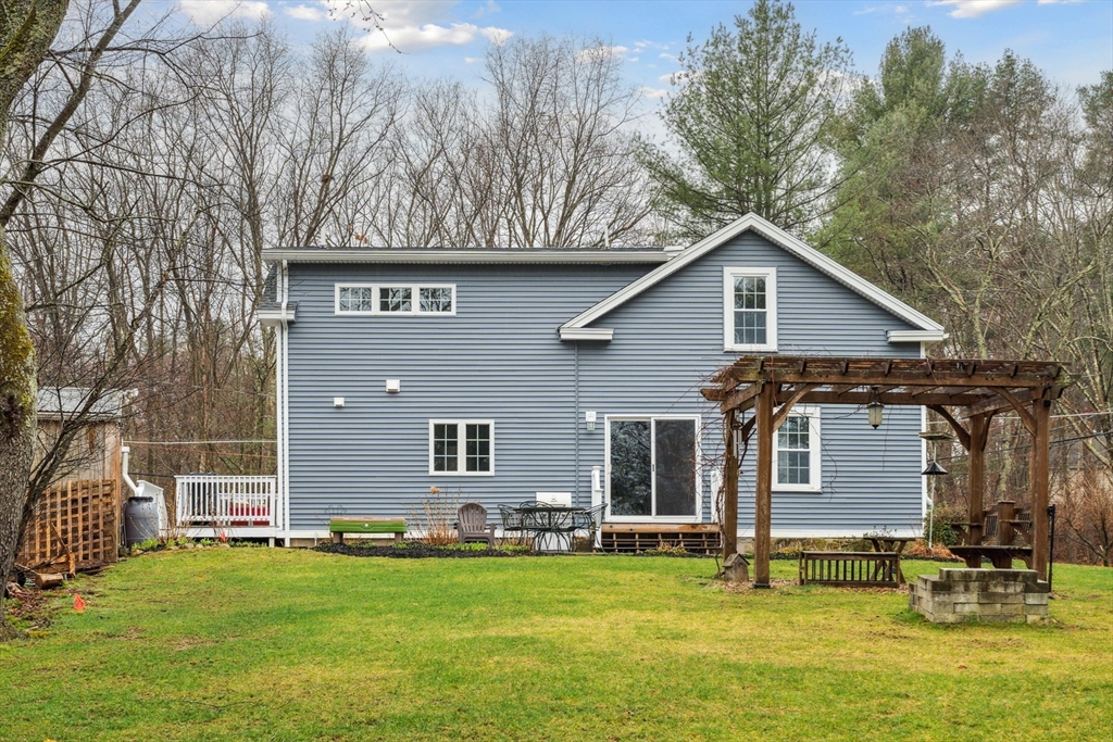 162 Proctor Road Chelmsford, MA 01824 - Photo 31 of 35 a front view of a house with a garden