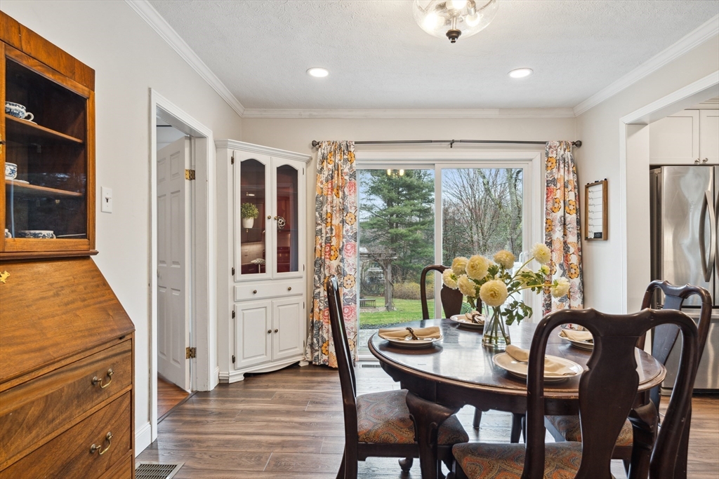 162 Proctor Road Chelmsford, MA 01824 - Photo 8 of 35 a view of a dining room with furniture window and outside view