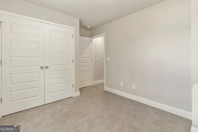 an empty room with closet