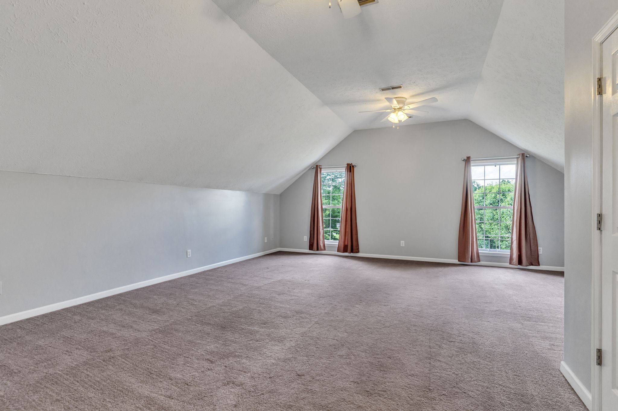 6689 East Benton Road Springfield, TN 37172 - Photo 33 of 44 an empty room with a ceiling fan and a window