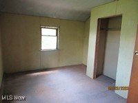 6545 Norwalk Road Medina, OH 44256 - Photo 7 of 10 Unfurnished bedroom with a closet