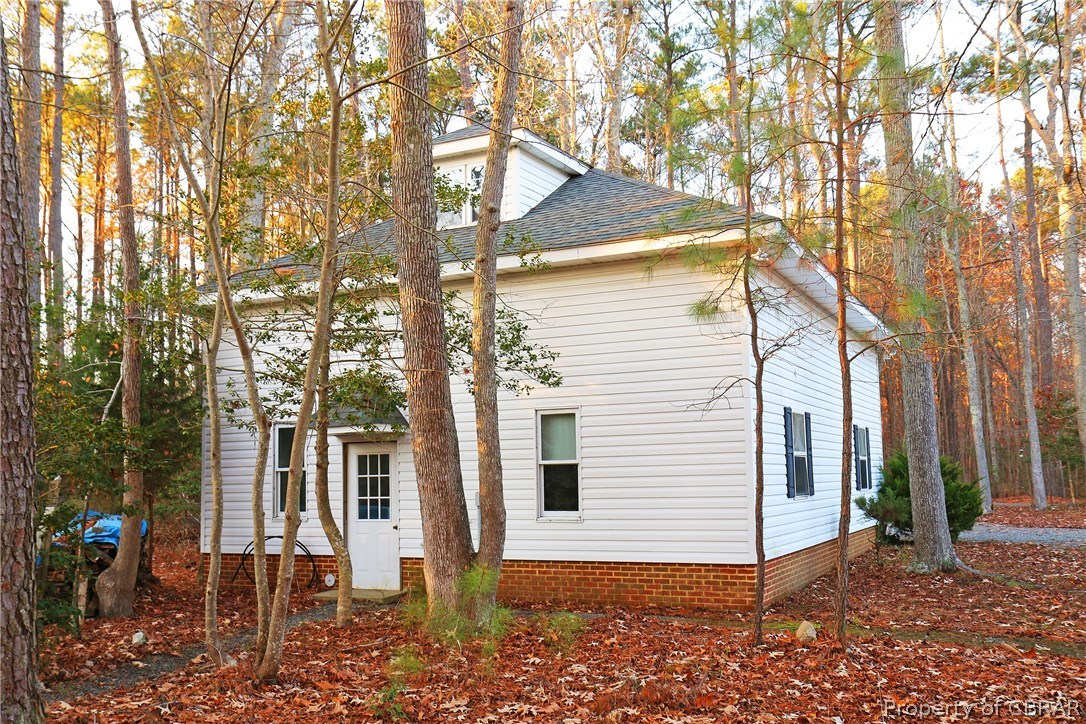 97 Barnes View Lane Kilmarnock, VA 22482 - Photo 5 of 20 Rear side of detached garage. Ample storage!