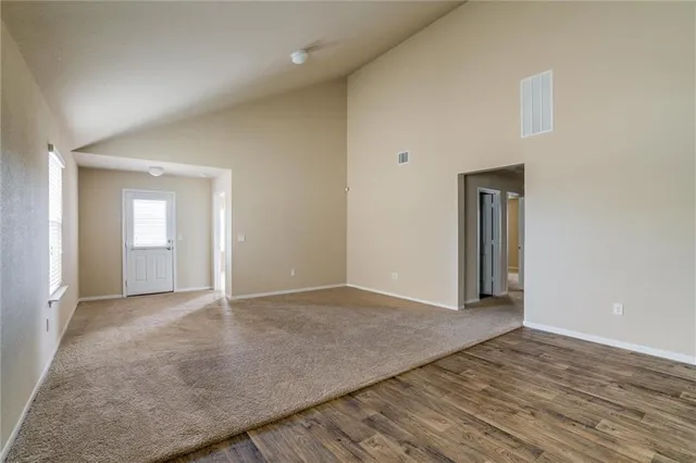 a kitchen with a stove and a microwave
