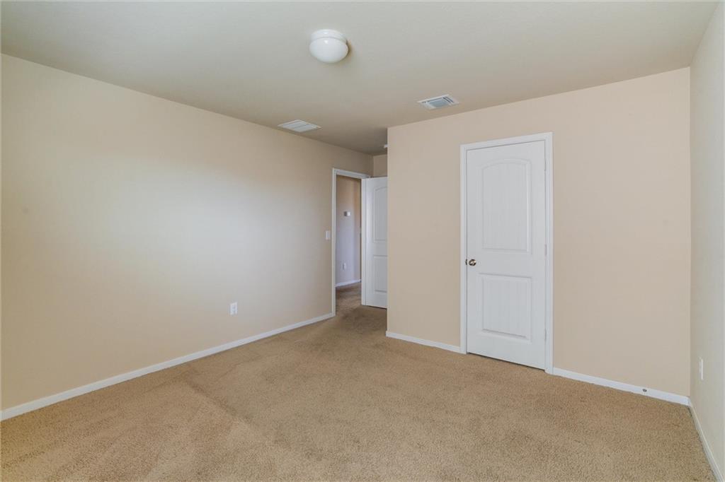 11704 Andesite Road Manor, TX 78653 - Photo 24 of 30 a view of an empty room