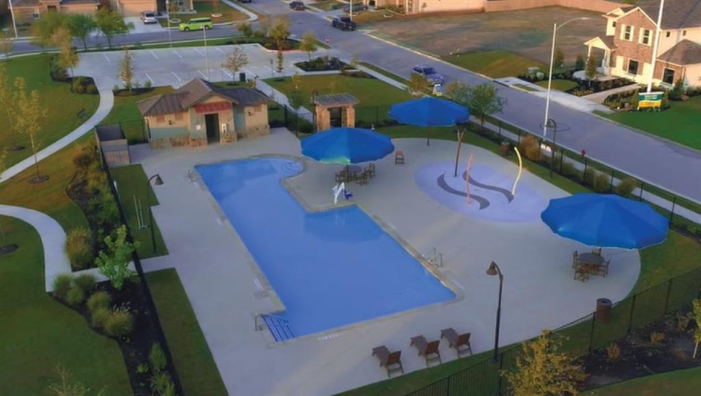 11704 Andesite Road Manor, TX 78653 - Photo 29 of 30 an aerial view of a house swimming pool patio and outdoor seating
