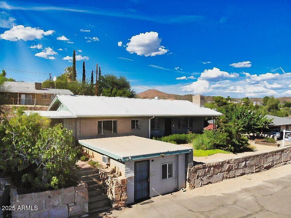 490 South 9th Street Globe, AZ 85501 - Photo 1 of 45 a view of a house with a swimming pool