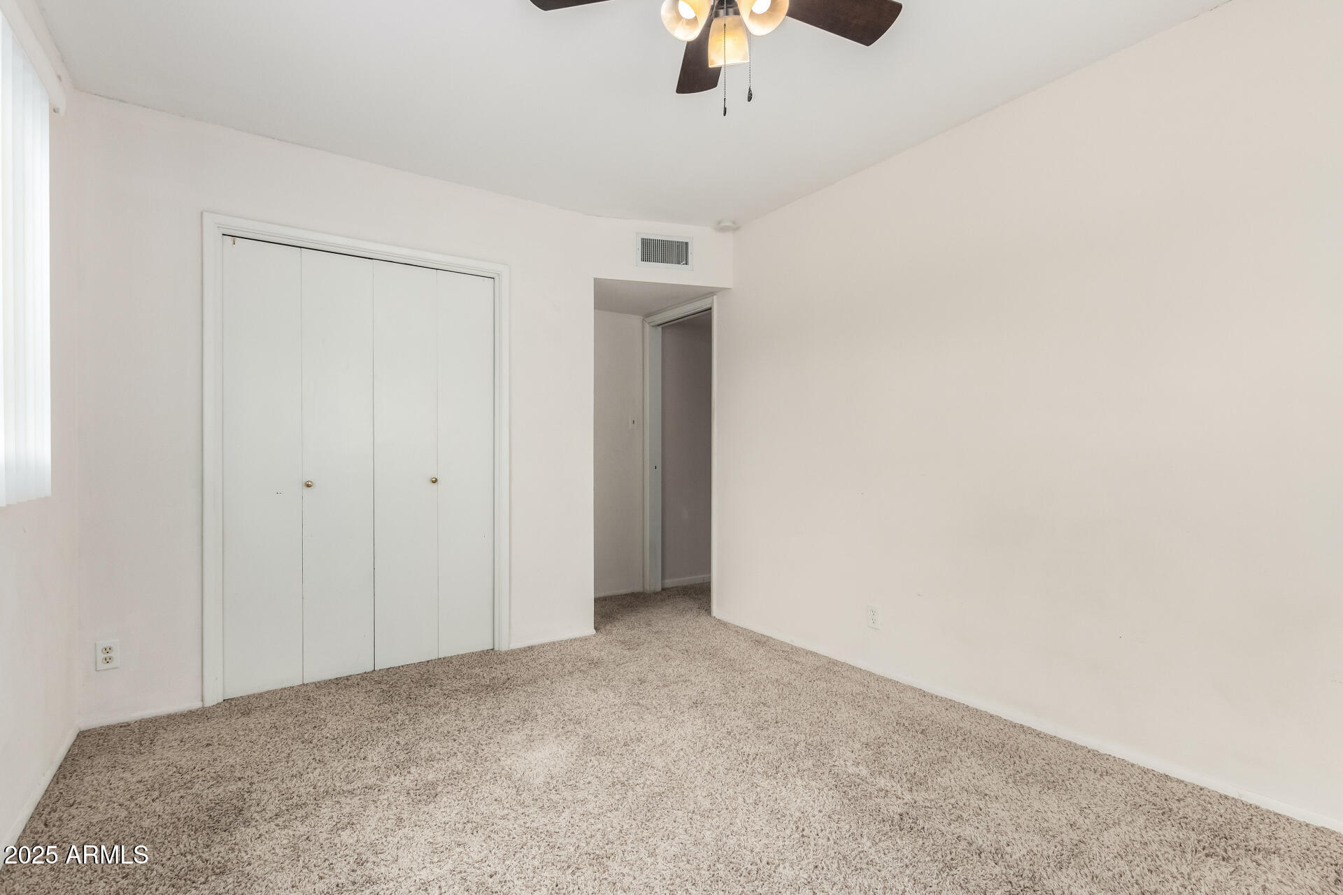 490 South 9th Street Globe, AZ 85501 - Photo 32 of 45 an empty room with ceiling fan