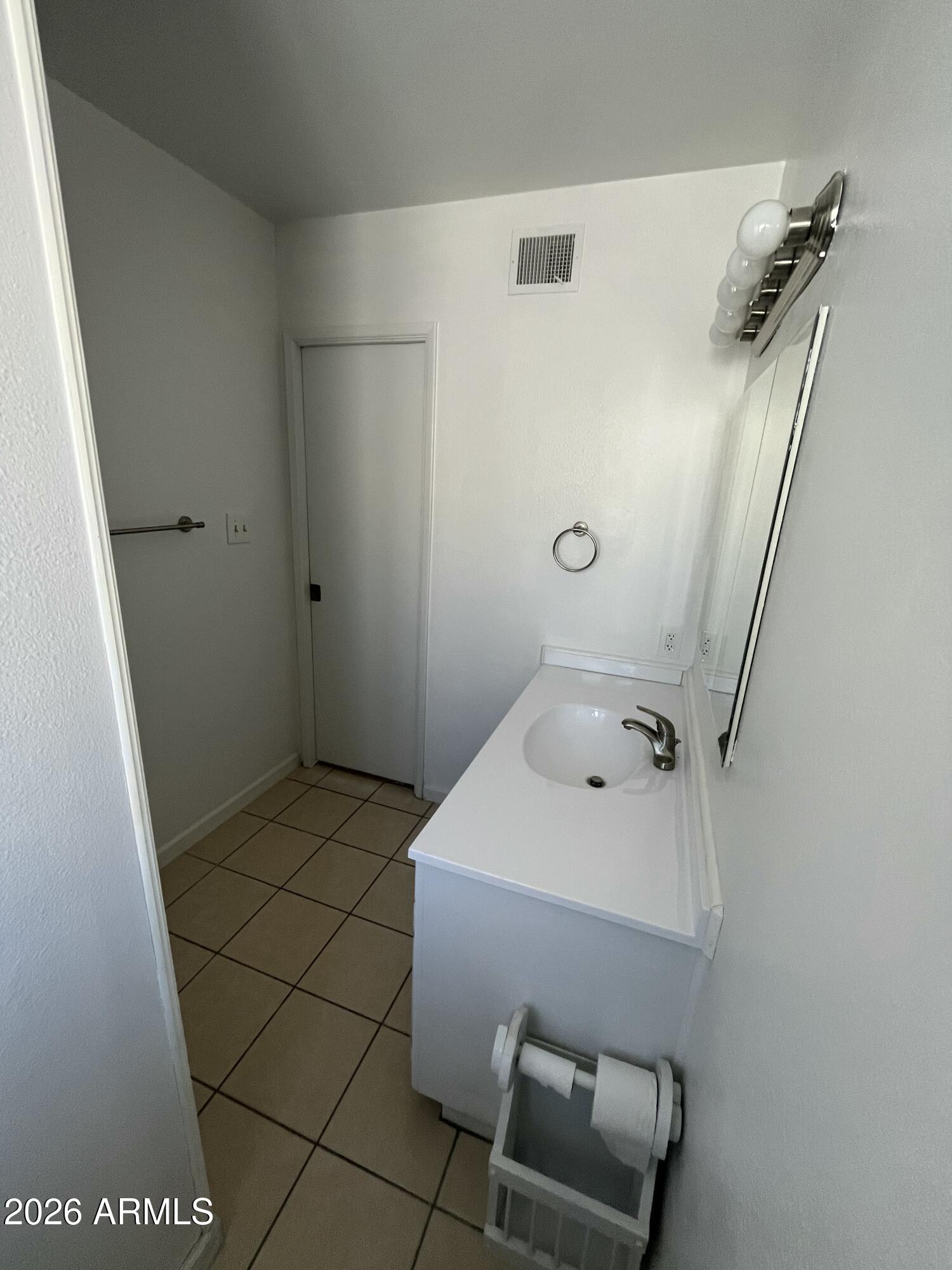 490 South 9th Street Globe, AZ 85501 - Photo 35 of 45 a bathroom with a sink and a mirror