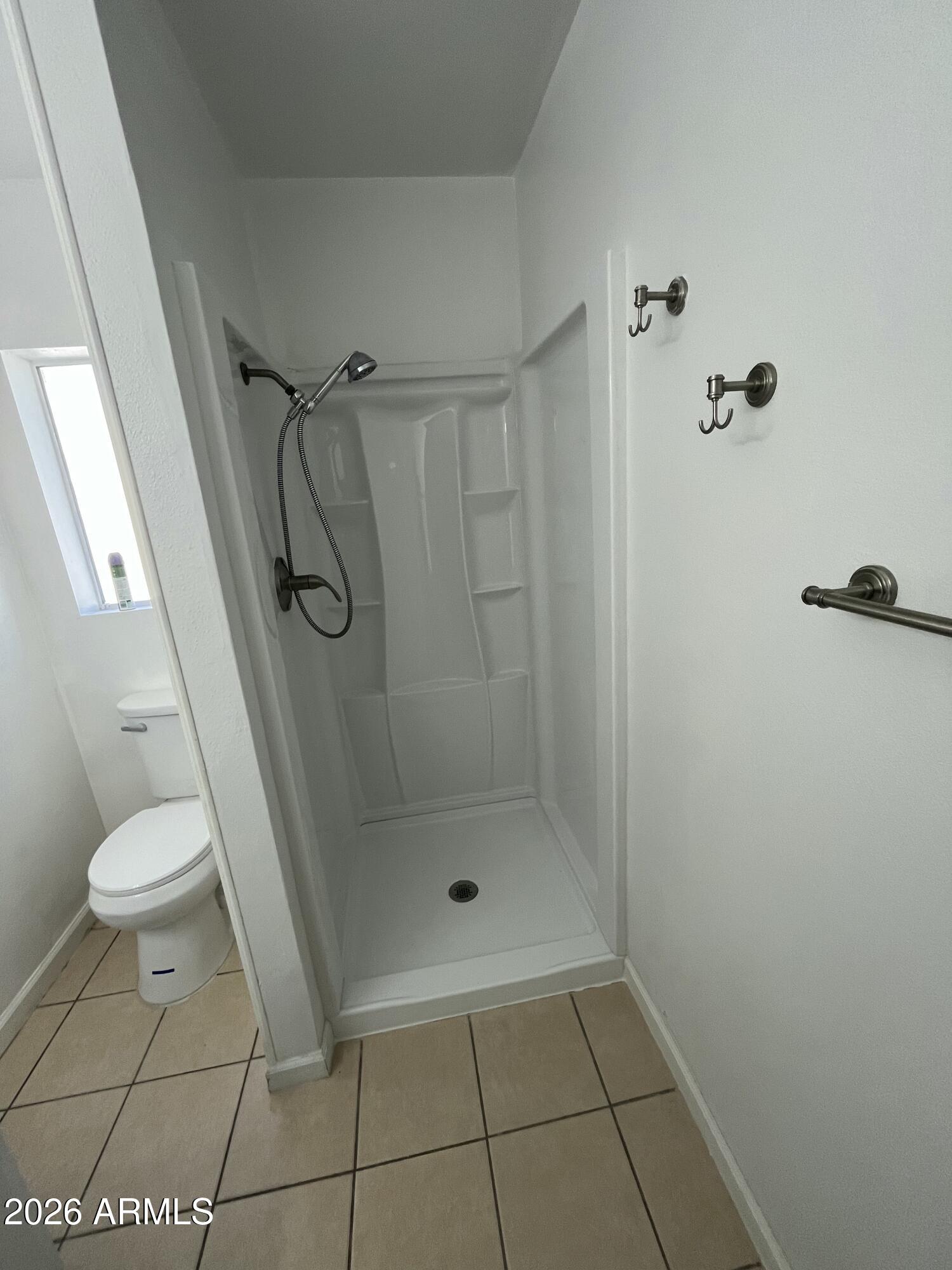 490 South 9th Street Globe, AZ 85501 - Photo 37 of 45 a bathroom with a shower and toilet