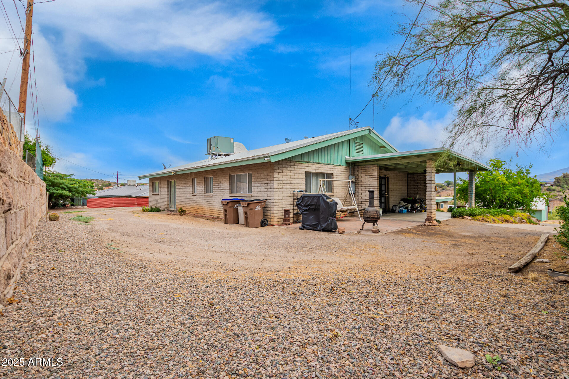 490 South 9th Street Globe, AZ 85501 - Photo 8 of 45 a view of a house with backyard and a tree
