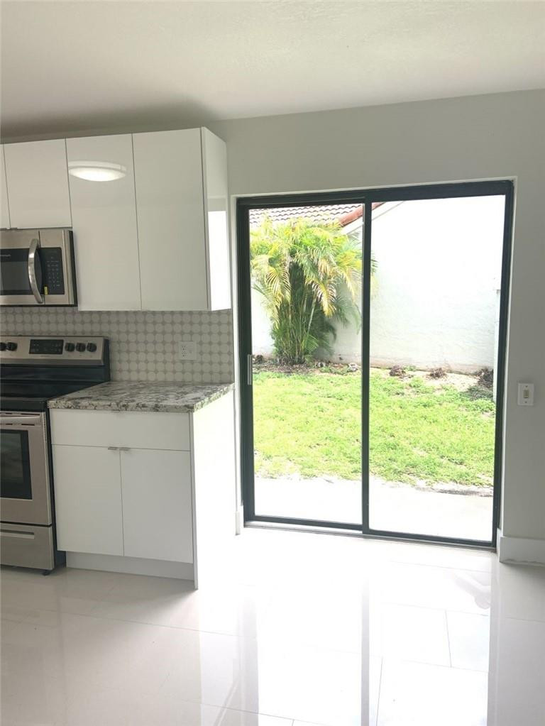 6376 Northwest 173rd Street Hialeah, FL 33015 - Photo 20 of 20 a kitchen with a large window