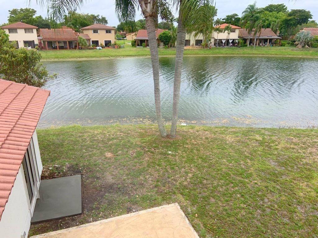 6376 Northwest 173rd Street Hialeah, FL 33015 - Photo 4 of 20 a view of a lake with houses