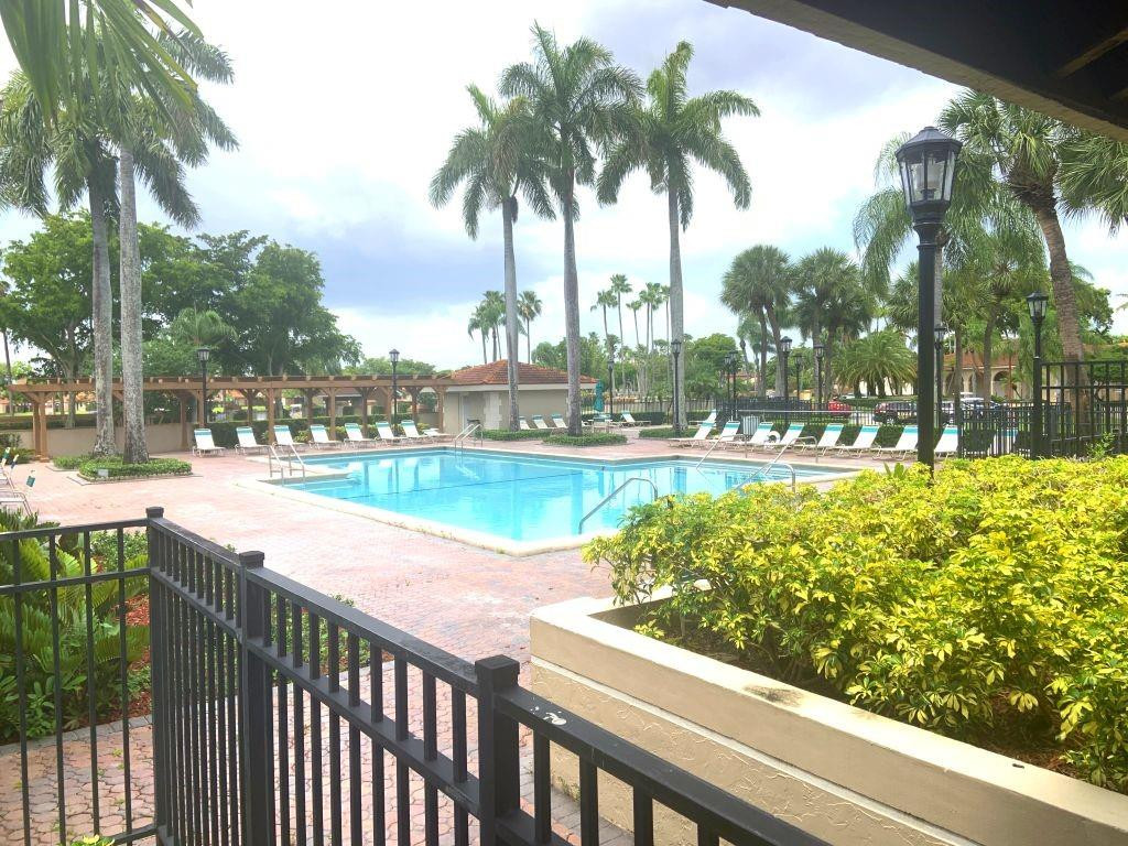 6376 Northwest 173rd Street Hialeah, FL 33015 - Photo 9 of 20 a view of swimming pool from a balcony