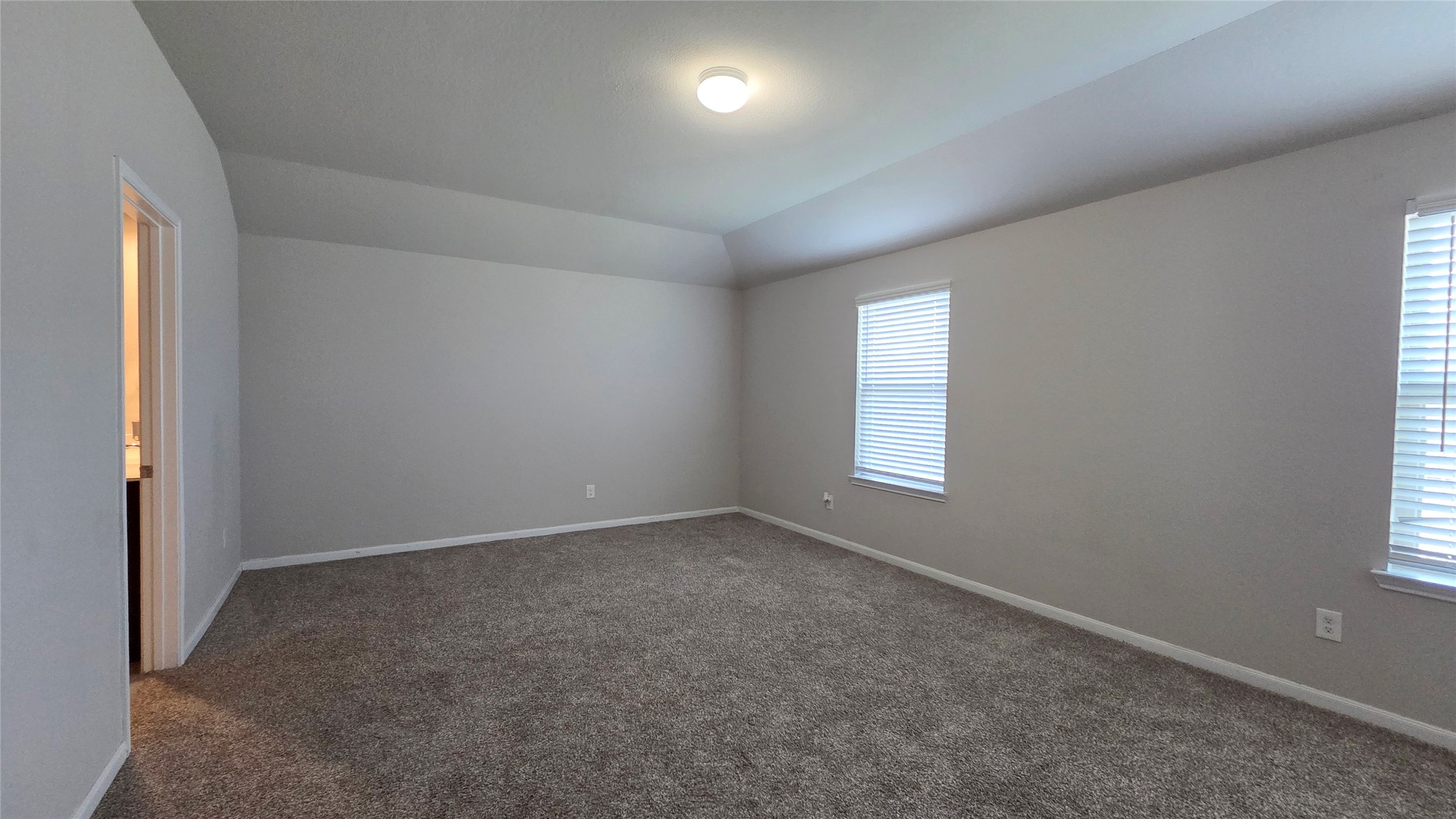 3518 Windham Way Katy, TX 77494 - Photo 11 of 18 an empty room with windows