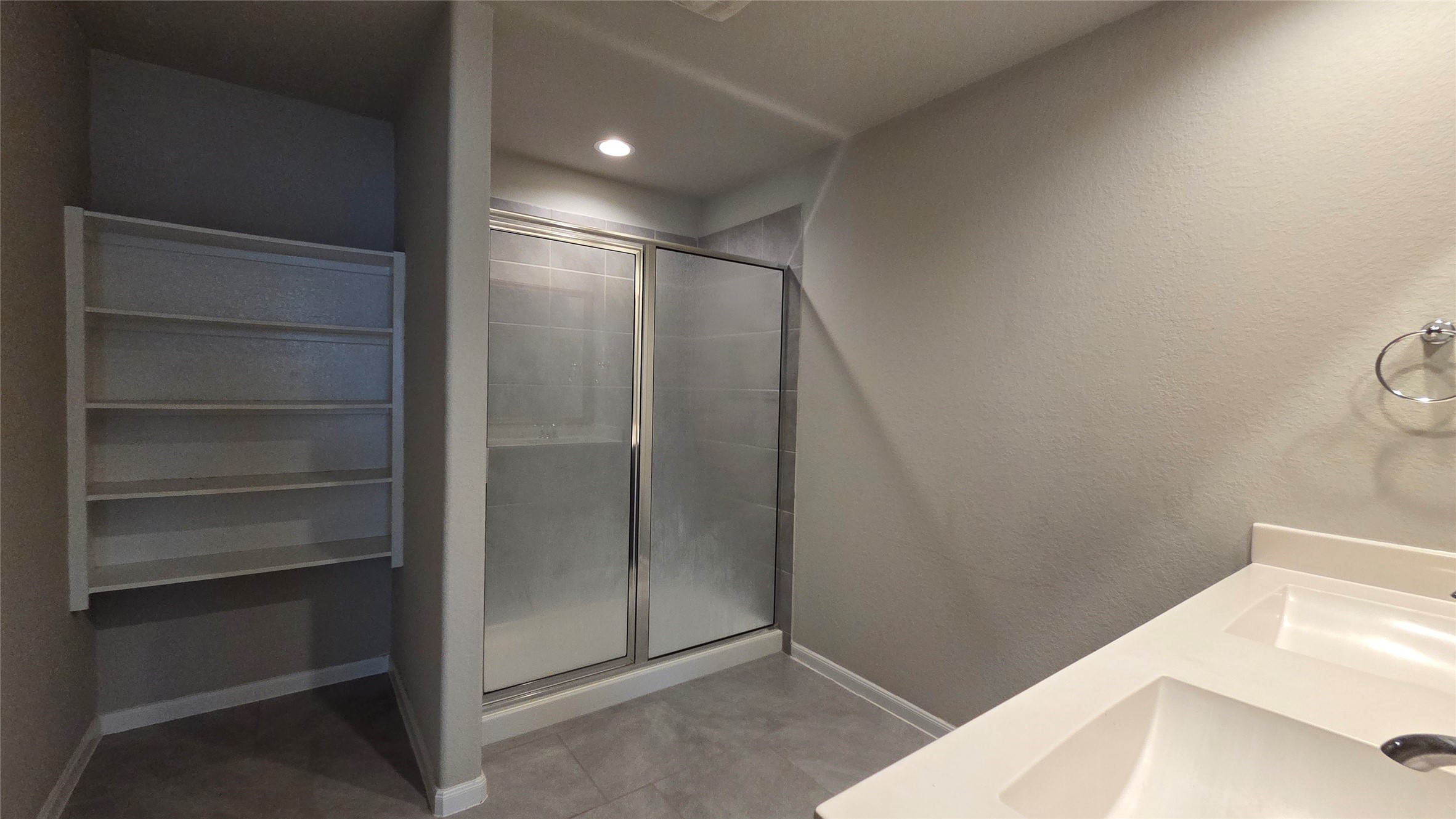 3518 Windham Way Katy, TX 77494 - Photo 12 of 18 a bathroom with a shower and a sink