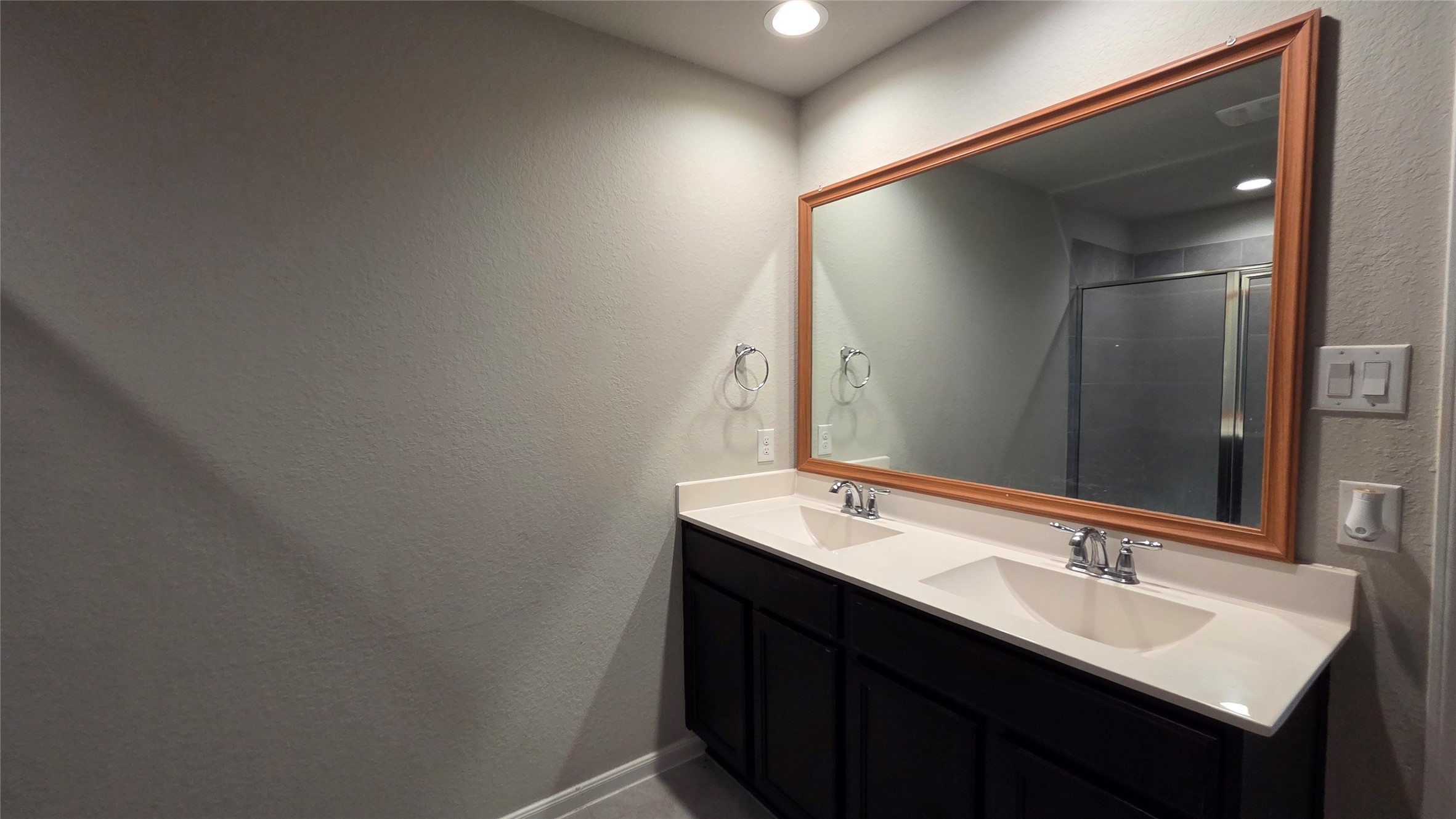 3518 Windham Way Katy, TX 77494 - Photo 13 of 18 a bathroom with a sink and a mirror