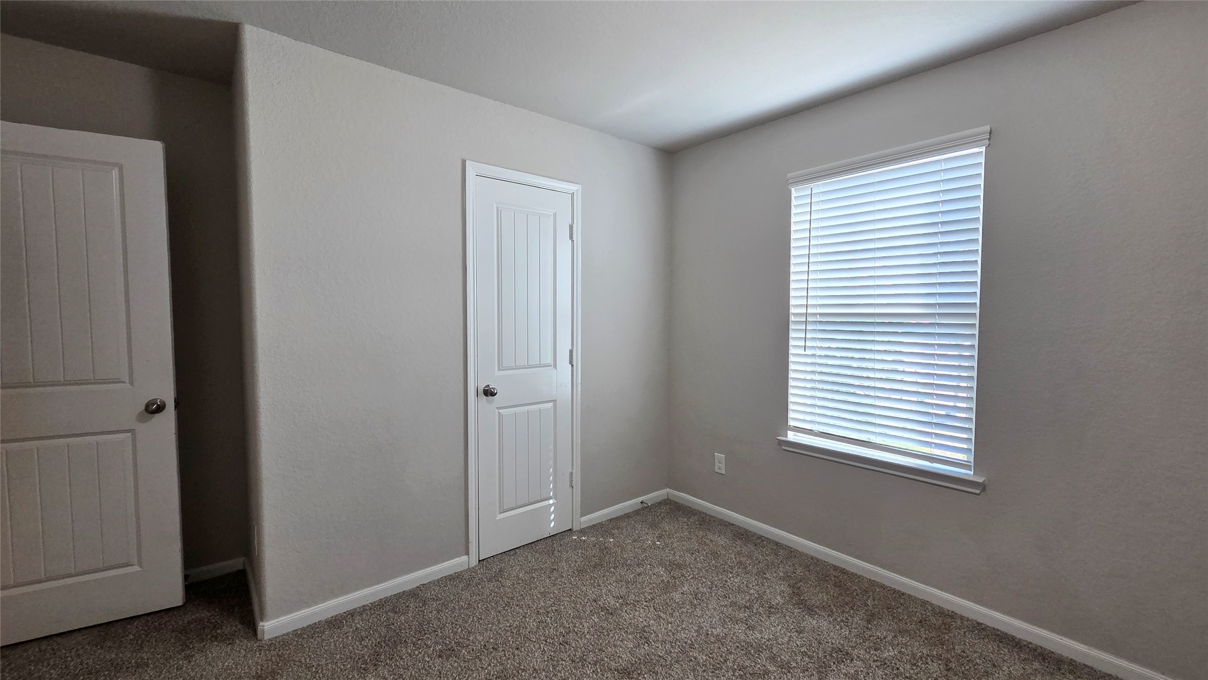3518 Windham Way Katy, TX 77494 - Photo 14 of 18 a view of an empty room with a window
