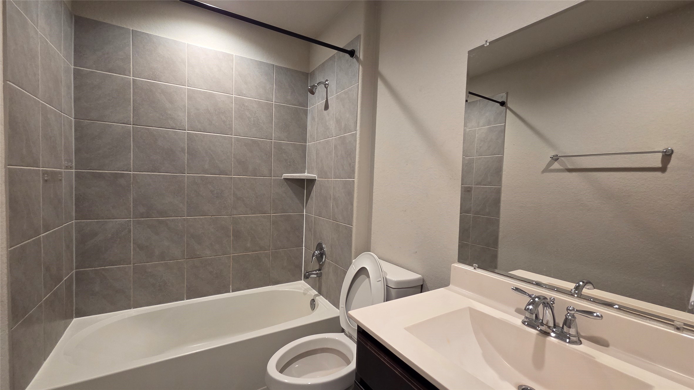 3518 Windham Way Katy, TX 77494 - Photo 15 of 18 a bathroom with a sink and a bathtub