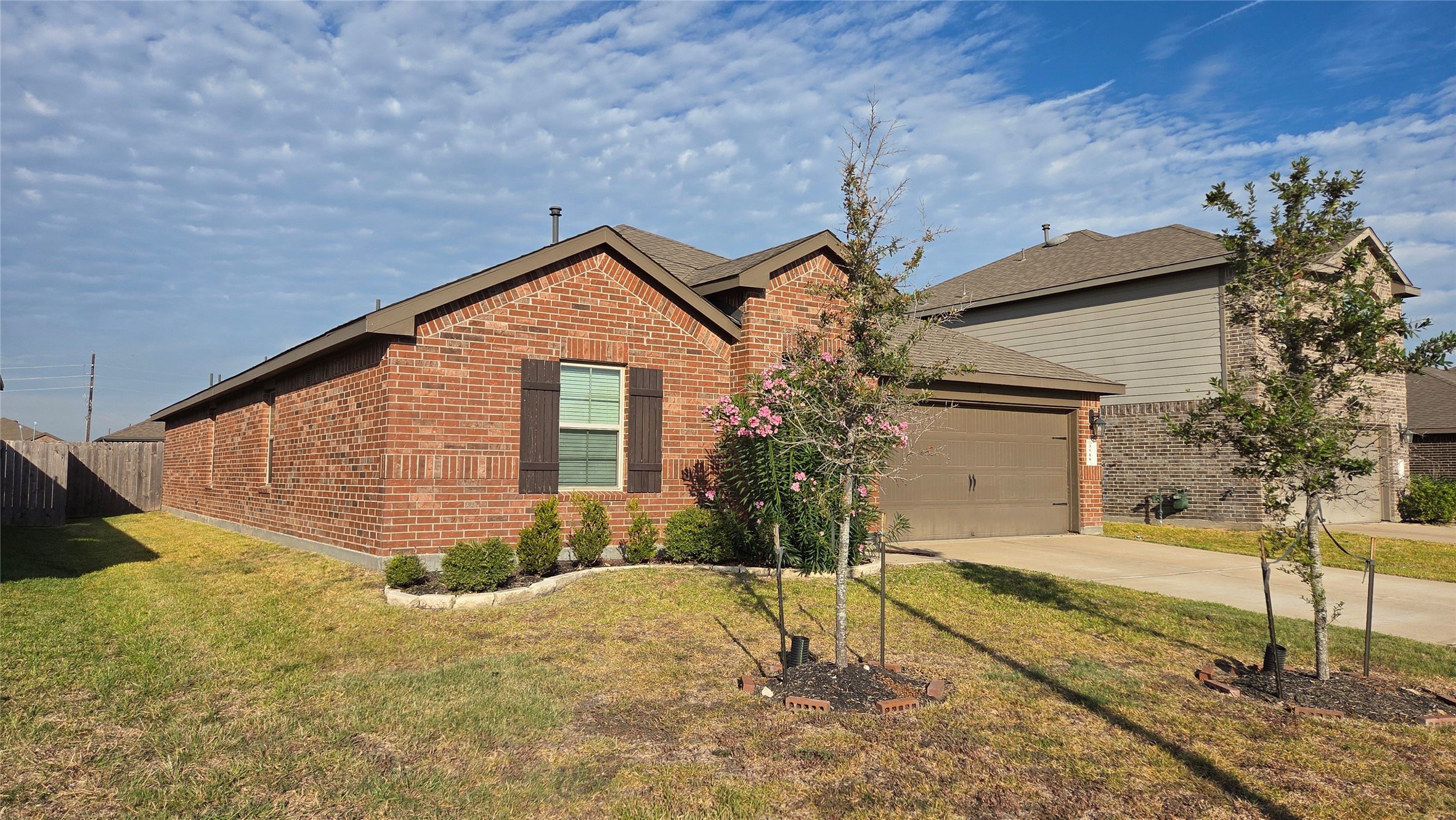 3518 Windham Way Katy, TX 77494 - Photo 2 of 18 a front view of a house with a yard