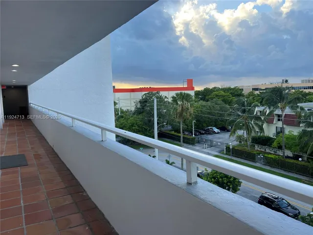 a view of a building from a balcony