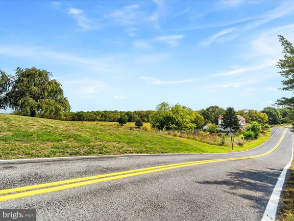 a view of a swimming pool with an ocean view