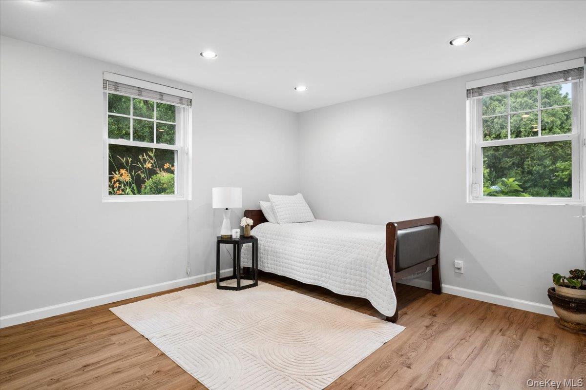 30 Stonehouse Road Scarsdale, NY 10583 - Photo 19 of 24 Recreation room on lower level, shown here with a bed but can be used as needed.