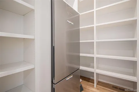 a view of an empty walk in closet