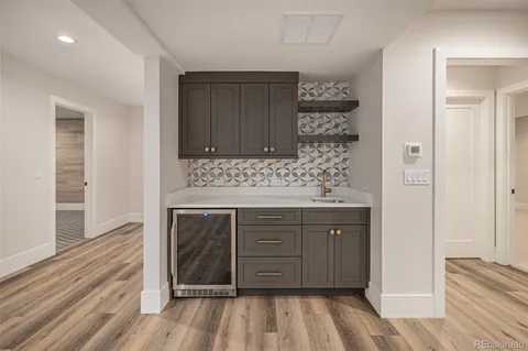 a view of cabinets and wooden floor