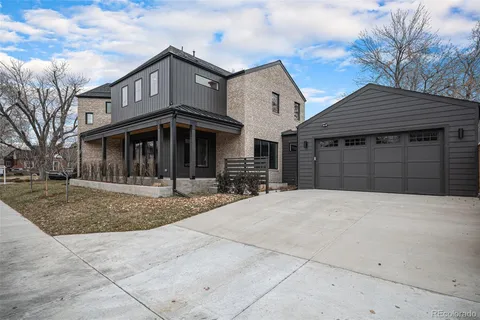 a front view of a house with a garage
