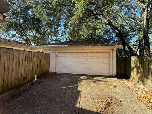 a view of a backyard of the house