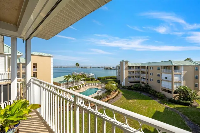 a view of a swimming pool with a lounge chairs