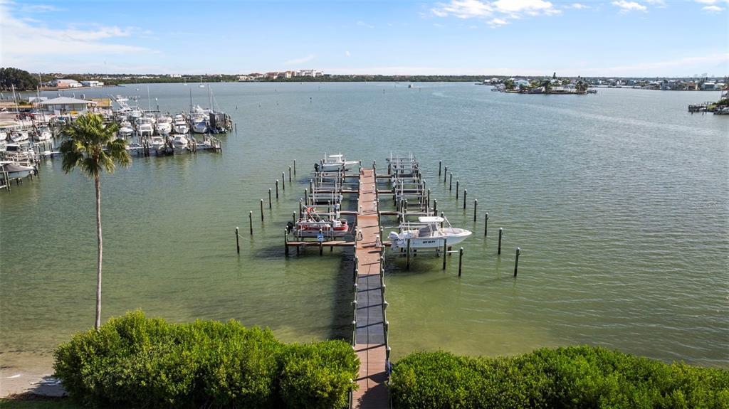 399 150th Avenue, Unit 309 Madeira Beach, FL 33708 - Photo 33 of 43 a view of a lake with boats in all around