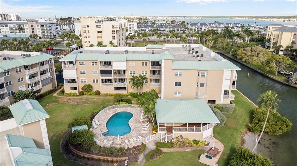 399 150th Avenue, Unit 309 Madeira Beach, FL 33708 - Photo 42 of 43 a view of a city that has tall buildings