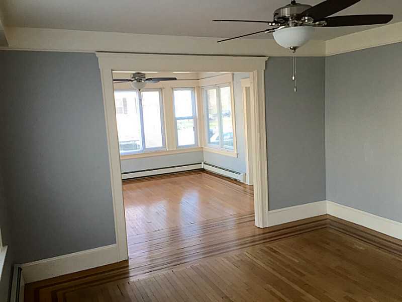 39 Ballou Street Woonsocket, RI 02895 - Photo 4 of 6 Dining Room. Unit #1; Dining room looking into living room.