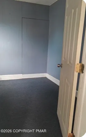 a view of small space with wooden floor